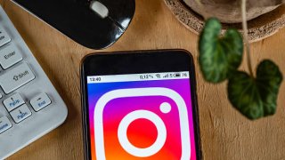 UKRAINE – 2020/11/06: In this photo illustration an Instagram logo is seen displayed on a smartphone. (Photo Illustration by Valera Golovniov/SOPA Images/LightRocket via Getty Images)