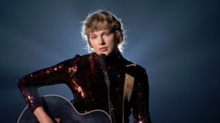 In this Sept. 16, 2020, file photo, Taylor Swift performs onstage during the 55th Academy of Country Music Awards at the Grand Ole Opry in Nashville, Tennessee.