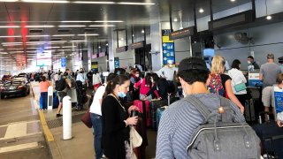Passengers at the Miami International Airport