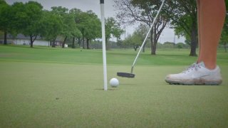 putting on golf green