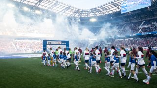 Players from the United States and Spain walk out with children for the start of the 2020 SheBelieves Cup match between United States and Spain sponsored by Visa. The match took place at Red Bull Arena on March 08, 2020 in Harrison, NJ, USA.