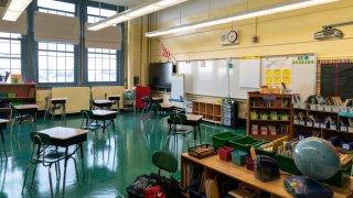Students' desk adhere to social distancing requirements in a classroom at a public elementary school in the Brooklyn borough of New York