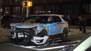 police hurt in a vehicle crash were taken to a nearby Queens hospital