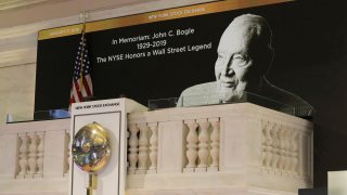 A tribute to Jack Bogle, founder and retired CEO of The Vanguard Group, is displayed on the bell balcony over the trading floor of the New York Stock Exchange in New York, January 17, 2019.