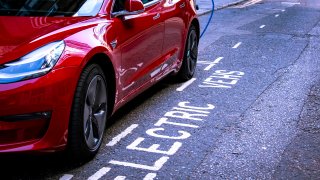 This photo, from June 2020, shows a Tesla Model 3 parked up and charging in central London.