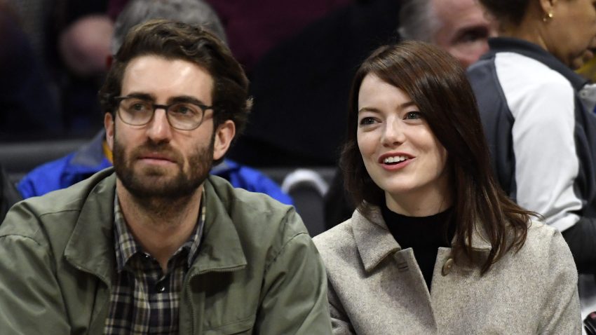 Emma Stone and Dave McCary attend the Golden State Warriors and Los Angeles Clippers basketball game at Staples Center on January 18, 2019 in Los Angeles, California.
