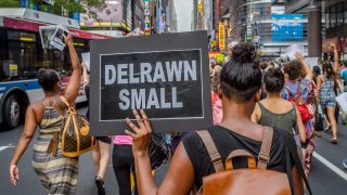 About two thousand New Yorkers marched in Manhattan bringing traffic to a halt for many hours demanding police accountability and to remember Delrawn Small