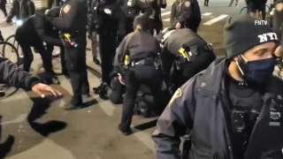 Police outside Barclays Center in Brooklyn arrest protesters Saturday evening