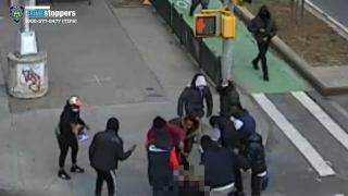 A group of males and females assaulted the victim at about 11:30 a.m. Friday near Canal and Allen streets in Manhattan, city police said