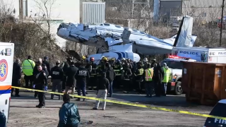 A small twin-engine plane crashed Sunday afternoon near a Long Island airport