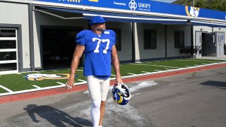 Los Angeles Rams offensive tackle Andrew Whitworth enters training camp field in Thousand Oaks, California, on Aug. 18, 2020.