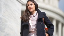 Rep. Alexandria Ocasio-Cortez, D-N.Y., is seen on the House steps of the Capitol before the House passed a  trillion coronavirus aid package by voice vote on Friday, March 27, 2020.