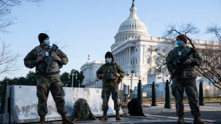 Members of the National Guard wear protective masks on duty outside of the U.S. Capitol on March 4, 2021 in Washington, DC.