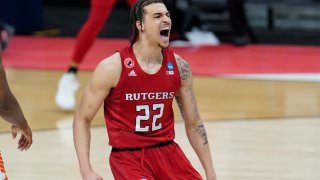 Rutgers guard Caleb McConnell (22) reacts to a basket against Clemson during the second half of a men's college basketball game in the first round of the NCAA