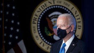 In this March 10, 2021, file photo, President Joe Biden wears a protective mask during an event in the Eisenhower Executive Office Building in Washington, D.C.