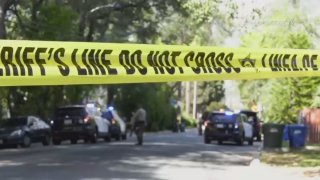 Investigators at the scene in Altadena, California, March 22, 2021.