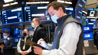 Traders on the floor of the New York Stock Exchange.