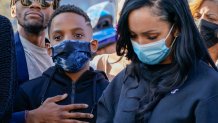 One of Dmx's sons, center, is joined by friends and family members during a prayer vigil for the rapper outside of White Plains Hospital, Monday, April 5, 2021, in White Plains, N.Y. Supporters and family of the rapper DMX have chanted his name and offered up prayers outside the hospital where he remains on life support. The 50-year-old was admitted to the hospital following a heart attack.