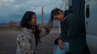 Director Chloe Zhao, left, appears with actress Frances McDormand on the set of "Nomadland."