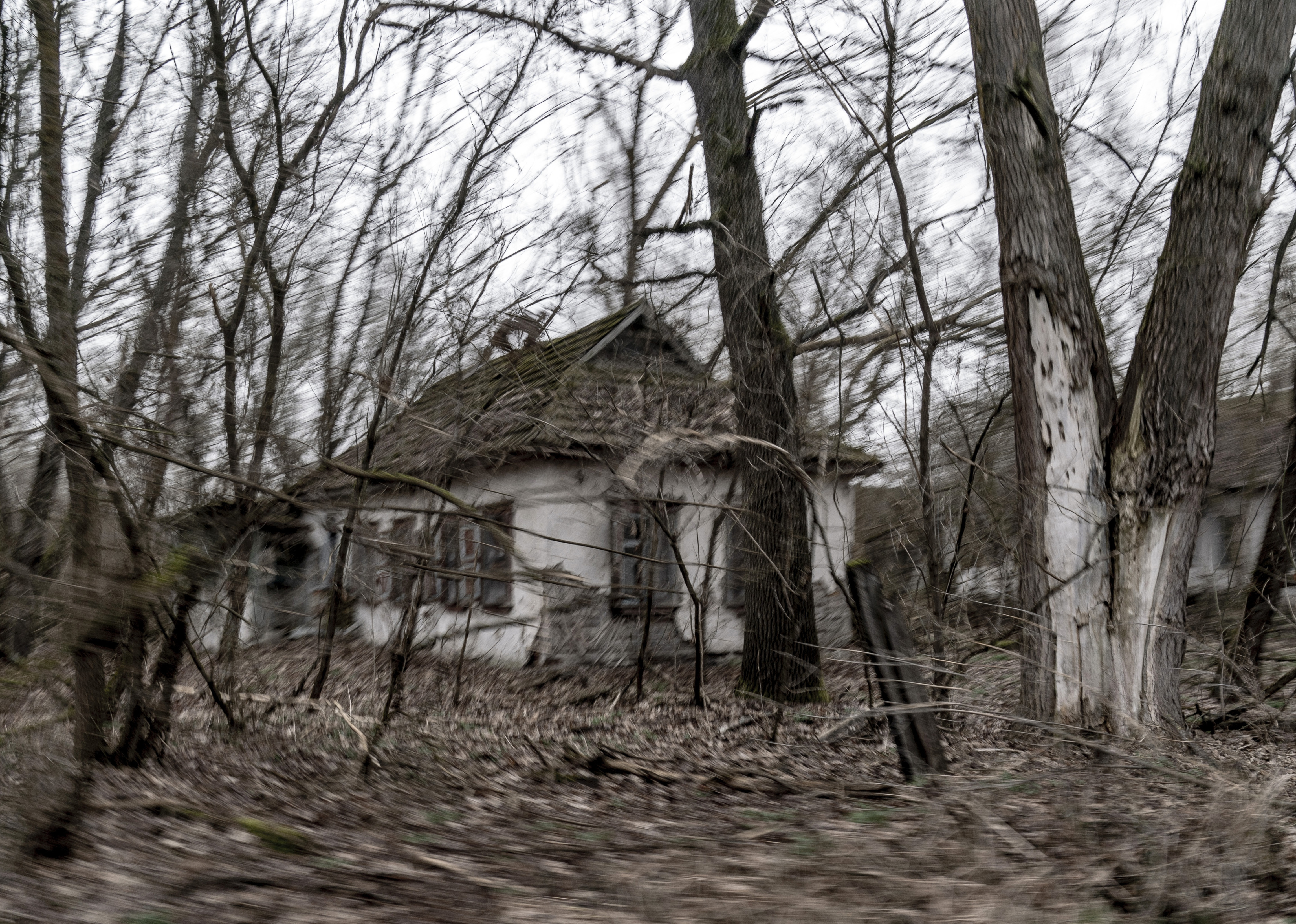 Abandoned country houses are seen at the Chernobyl exclusion zone, Ukraine, April 13, 2021. The Ukrainian authorities are calling for the exclusion zone of objects to be included in the UNESCO World Heritage List.