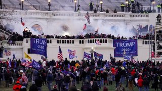 FILE - In this Jan. 6, 2021, file photo, rioters storm the U.S. Capitol in Washington.