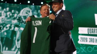 Zach Wilson with Roger Goodell after being drafted