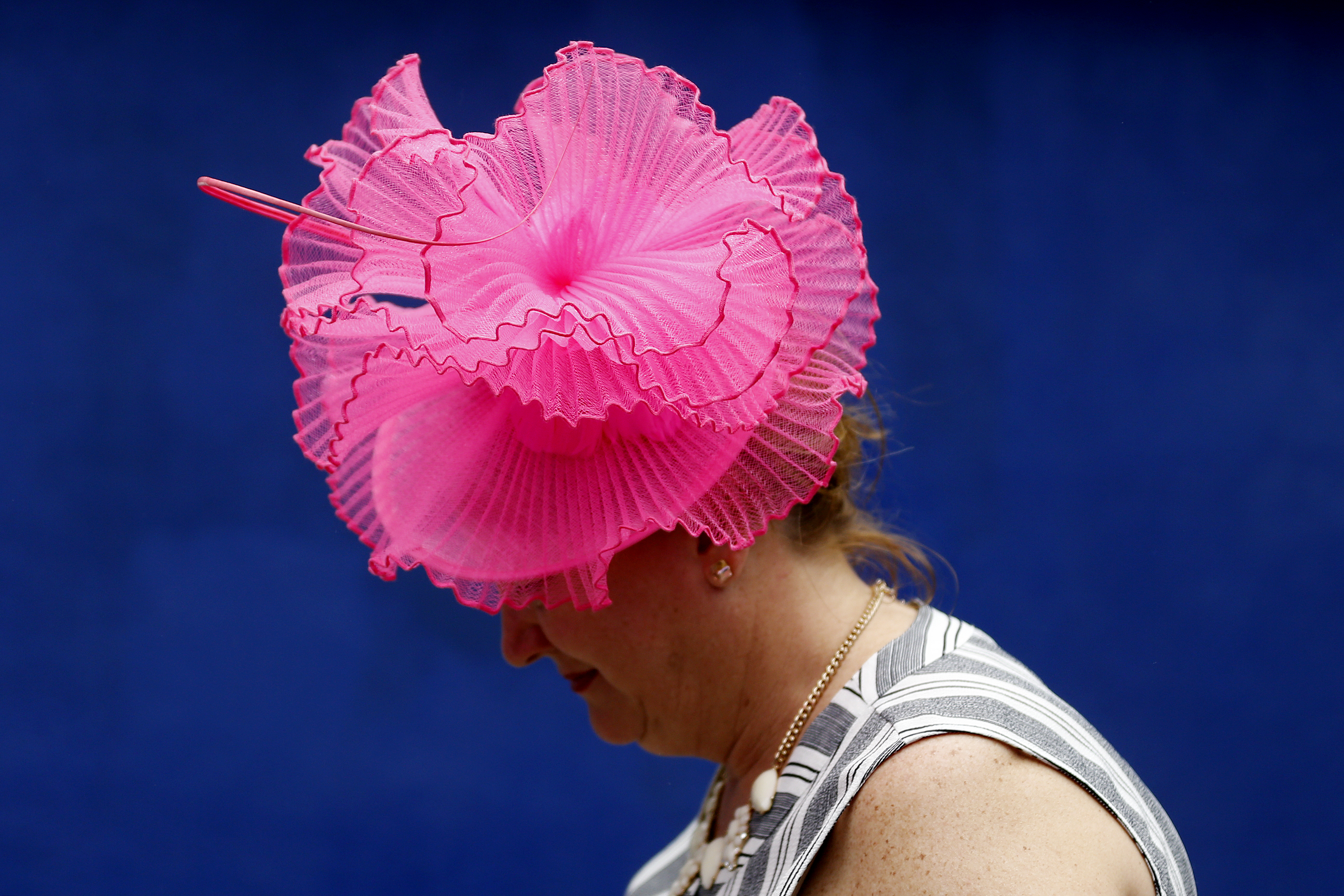 A woman wearing a frilled fascinator looks on prior to the 145th running of the Kentucky Derby at Churchill Downs on May 4, 2019, in Louisville, Kentucky.