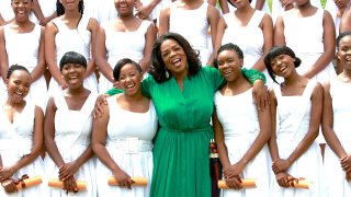 Talk show host and philanthropist Oprah Winfrey poses with the graduates from the inaugural class at the Oprah Winfrey Leadership Academy for Girls, Henley-on-Klip, South Africa, January 14, 2012.
