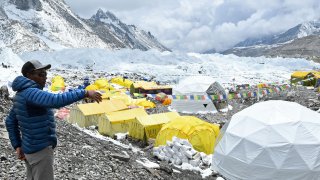 In this photograph taken on May 2, 2021, Nepal's mountaineer Kami Rita Sherpa poses for a picture during an interview with AFP at the Everest base camp in the Mount Everest region of Solukhumbu district.