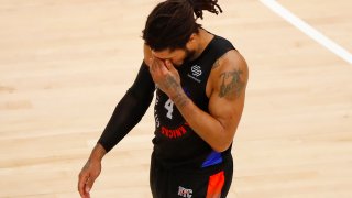 Derrick Rose walks off court