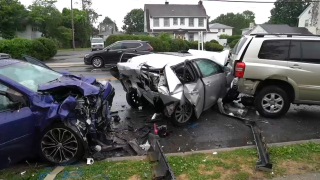 Cars on a street in Hempstead were seriously damaged in the aftermath of a deadly crash Saturday.