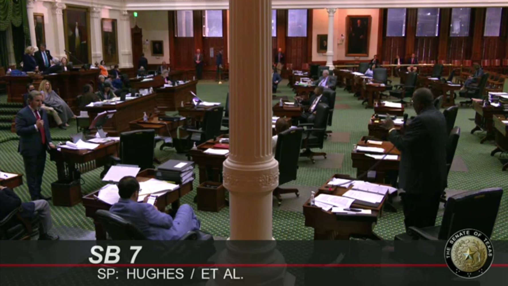 Sen. Bryan Hughes (R-Tyler), left, discusses Senate Bill 7, the Texas voting bill which he authored, with Sen. Royce West (D-Dallas), right, on Sunday, May 30, 2021.