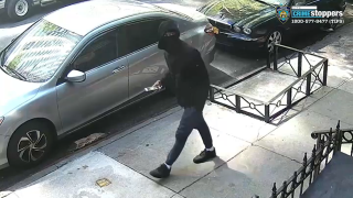 A screenshot from surveillance video shows a suspect wanted by police in a fatal shooting on the Upper East Side.