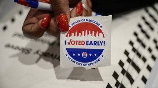 A sticker is displayed a voting station at the Metropolitan Museum of Art (MET) during the mayoral election process in New York on June 12, 2021. (Photo by Ed JONES / AFP) (Photo by ED JONES/AFP via Getty Images)