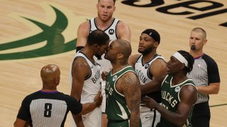 Kevin Durant and P.J. Tucker exchange words