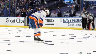 Islanders player with head down