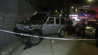 A Jeep crashed into a fence after jumping a curb and hitting six people, police say.