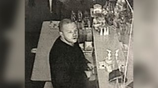 This security camera image provided by the Lane County Sheriff's Department released Friday, June 18, 2021 shows a suspect in a hit-and-run crash and shootings in the small city of Noti, in southwest Oregon that left three people dead. Authorities are seeking the publics help in finding and identifying the suspect.