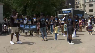 Families march in Brooklyn for the second annual "March of Dads."