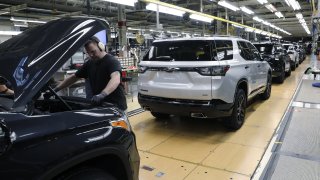 General Motors Co. Chevrolet Traverse sports utility vehicles (SUV) sit on the assembly line at the company’s Lansing Delta Township Assembly Plant in Lansing, Michigan, on Friday, Feb. 21, 2020.