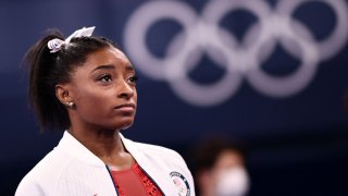 USA's Simone Biles looks on