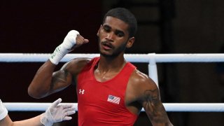 U.S. boxer Delante Johnson celebrates his victory over Argentina's Brian Agustin Arregui at the 2020 Tokyo Olympic Games