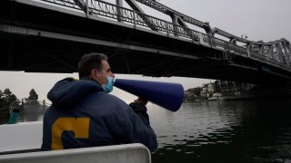 Mike Teti speaks into a megaphone