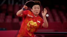 Singapore's Feng Tianwei competes during the table tennis women's singles third round match against Spain's María Xiao at the 2020 Summer Olympics, Monday, July 26, 2021, in Tokyo.