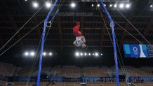 Carlos Edriel Yulo, of Philippines, performs on the rings during the men's artistic gymnastic qualifications