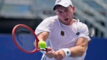 Dominik Koepfer, of Germany, plays Pablo Carreno Busta, of Spain, during the third round of the tennis competition at the 2020 Summer Olympics, Wednesday, July 28, 2021, in Tokyo, Japan.