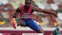 Rai Benjamin, of United States, competes in a heat in the men's 400-meter hurdles