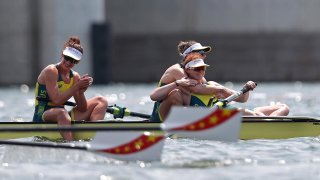 Rosemary Popa, Jessica Morrison and Annabelle Mcintyre of Team Australia celebrate winning the gold medal during the Women's Four Final A
