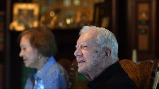Former President of the United States, Jimmy Carter sits next to his wife, former First Lady, Rosalynn Carter while having dinner at the home of friend, Jill Stuckey and being interviewed by reporters on Saturday August 04, 2018 in Plains, GA.