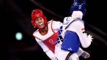 Paige McPherson (L) of Team United States competes against Hedaya Wahba of Team Egypt Women's -67kg Taekwondo Bronze Medal contest on day three of the Tokyo 2020 Olympic Games at Makuhari Messe Hall on July 26, 2021 in Chiba, Japan.